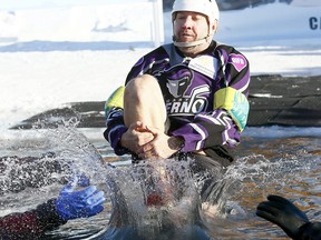 Sheldon Kennedy during the 9th Annual Old Guys in Action Calgary Ice Breaker Polar Dip where 99 particants took part in this years event at the Elbow Valley Resident's Club raising money for the SA Foundation fighting human trafficking on Monday January 1, 2018. Darren Makowichuk/Postmedia