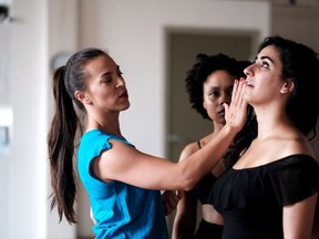 Intimacy coach Siobhan Richardson, left, works with Dainty Smith and Julia Matias in rehearsals of Serenity Wild at Summerworks Performance Festival in Toronto in this August 2017 handout photo. When theatre groups turn to fight choreographer Richardson for help, it's usually because they're looking to stage a convincing brawl or scuffle.