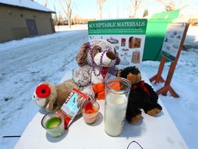 A small collection of items are shown at the scene in northwest Calgary on Tuesday, January 2, 2018 a short distance from where a newborn baby girl was found deceased on Christmas Eve A vigil is to be held on Wednesday night for the baby and police continue to search for the mother and any witnesses. Jim Wells/Postmedia
