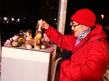 Supporters gather during a candlelight vigil in northwest Calgary on Wednesday, January 3, 2018 for the baby found dead on Christmas Eve. Abouth 100 or more Calgarians and made respects for the newborn. Police and still looking for the mother and any other clues in the case. Jim Wells/Postmedia