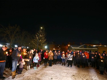 Supporters gather during a candlelight vigil in northwest Calgary on Wednesday, January 3, 2018 for the baby found dead on Christmas Eve. Abouth 100 or more Calgarians and made respects for the newborn. Police and still looking for the mother and any other clues in the case. Jim Wells/Postmedia