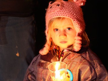 Supporters gather during a candlelight vigil in northwest Calgary on Wednesday, January 3, 2018 for the baby found dead on Christmas Eve. Abouth 100 or more Calgarians and made respects for the newborn. Police and still looking for the mother and any other clues in the case. Jim Wells/Postmedia