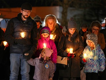 Supporters gather during a candlelight vigil in northwest Calgary on Wednesday, January 3, 2018 for the baby found dead on Christmas Eve. Abouth 100 or more Calgarians and made respects for the newborn. Police and still looking for the mother and any other clues in the case. Jim Wells/Postmedia