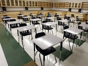 EDMONTON, ALBERTA: August 18-2010: Lori Nagy, spokesperson for the Edmonton Catholic schools gave the media a tour of the three new Catholic  schools that will open in suburban neighbourhoods this fall.  New classrooms with clean desks  at Monsignor Fee Otterson located at 1834 Rutherford Road SW on August 18. (Photo by  Brian J. Gavriloff / Edmonton Journal)