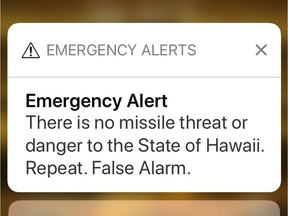 This smartphone screen capture shows the retraction of a false incoming ballistic missile emergency alert sent from the Hawaii Emergency Management Agency system on Saturday, Jan. 13, 2018. Hawaii Sen. Brian Schatz says the false alarm about a missile threat was based on "human error" and was "totally inexcusable."