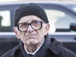 Former sportswriter Red Fisher arrives for the funeral of Montreal Canadiens' hockey legend Dickie Moore at the Mountainside United Church, in Montreal, on Monday, Dec. 28, 2015. Legendary hockey writer Fisher has died. The Montreal Gazette, where he worked the last 33 years of his career, reported on Friday that Fisher had died at age 91. THE CANADIAN PRESS/Graham Hughes ORG XMIT: CPT143