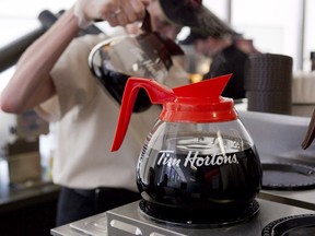 Tim Hortons employees at the two Cobourg locations will have to pay at least half of health and dental benefits and lose their paid breaks.