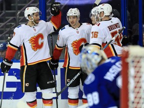 TAMPA, FL - JANUARY 11: Mikael Backlund #11 of the Calgary Flames celebrates a goal during a game against the Tampa Bay Lightning at Amalie Arena on January 11, 2018 in Tampa, Florida.