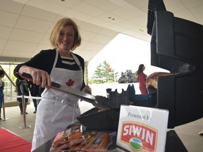 Premier Rachel Notley barbecues at a joint energy and agriculture reception in Tokyo on April 26, 2017, to raise the profile of Alberta energy and agri-food products like Alberta beef and pork, in Japan.