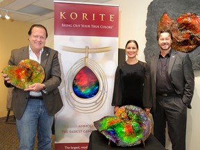 The team at KORITE, from left: Martin Bunting, chief executive, Amarjeet Grewal, executive vice-president,  and Jay Maull, president, with some examples of Ammolite.