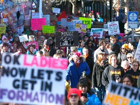 Thousands of Calgarians came out to join others around the world by taking part in the Women’s March at city hall on Thursday, January 18, 2018.