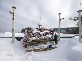 A memorial outside the La Loche Community School in La Loche, Sask. on Thursday, February 22, 2018.