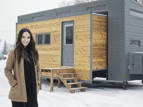 Shannon Novak, marketing specialist for ZeroSquared Tiny Homes, stands outside the ëAuroraíóthe Calgary-based companyís first show home on Friday, Feb. 2018. Kerianne Sproule/Postmedia