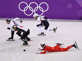 Kwang Bom Jong of North Korea crashes out during the Men's Short Track Speed Skating 500m Heats on day eleven of the PyeongChang 2018 Winter Olympic Games at Gangneung Ice Arena on February 20, 2018 in Gangneung, South Korea.