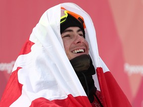 Sebastien Toutant of Quebec celebrates winning the gold medal in the men's big air event at the Pyeongchang 2018 Winter Olympic Games.