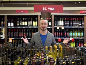 Butiq Escapes CEO Aidan Henry, picking out a few bottles of BC wine to send to a few favourite clients "suffering" in Alberta. (provided)