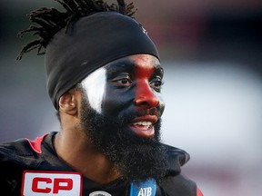 Calgary Stampeders safety Josh Bell is the team's new DB coach.