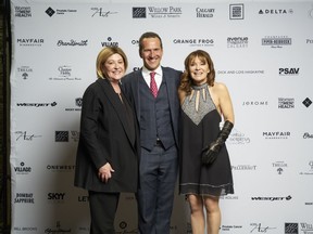 Pictured with 150,000 reasons to smile at the inaugural Women For Men's Health Gloves-On Gala held Feb. 2 at Hotel Arts are, from left: Prostate Cancer Centre executive director Pam Heard; Hotel Arts general manage Mark Wilson; and gala chair Dr. Shelley Spaner. The fab fete netted $150,000 for the Men's Health initiative at the Prostate Cancer Centre.