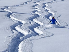 A skier in Lake Louise on Friday, Feb. 9, 2018.