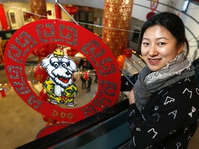 Tina Mao, Manager of the Calgary Chinese Cultural Centre is busy getting ready for this weekends Chinese New Year, Calgary's biggest Chinese cultural celebration and will feature traditional performances and a New Year market on Thursday February 15, 2018. Darren Makowichuk/Postmedia