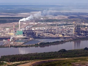 The Suncor mine facility along the Athabasca river as seen from a helicopter tour of the oil sands near Fort McMurray.