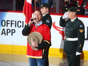 George Canyon sings the national anthem before game action between the Tampa Bay Lightning and Calgary Flames in Calgary on Thursday, February 1, 2018. Jim Wells/Postmedia