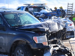 Some of the vehicles damaged in a pileup in the westbound lanes of Stoney Trail S.E. last Friday. A Calgary Transit driver says motorists tend to drive too fast for road conditions.