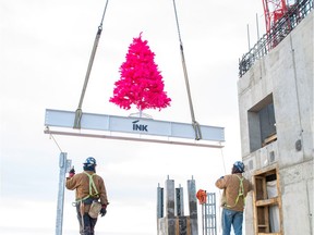 The pink tree moves into position as Ink by Battistella celebrates its topping off in East Village.