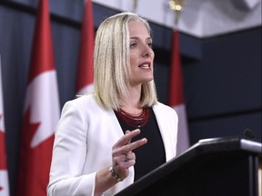 Minister of Environment and Climate Change Catherine McKenna speaks during a press conference on the government's environmental and regulatory reviews related to major projects, in the National Press Theatre in Ottawa on Thursday, Feb. 8, 2018.