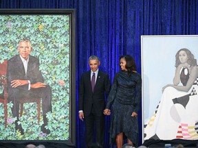 Former President Barack Obama and his wife, Michelle Obama, at the unveiling of their official portraits on Feb. 12, 2018 at the National Portrait Gallery in Washington, D.C.