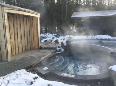 Heated cedar huts will keep robes warm while guests are in the pools at the Kananaskis Nordic Spa.