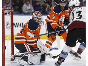 Edmonton Oilers goaltender Cam Talbot (33) looks at a near miss during the second period of a NHL game between against the Colorado Avalanche at Rogers Place in Edmonton on Thursday, Feb. 22, 2018. (Ian Kucerak)