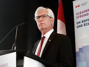 Natural Resources Minister Jim Carr announces a new project assessment process at a press conference in Calgary on Feb. 8, 2018.