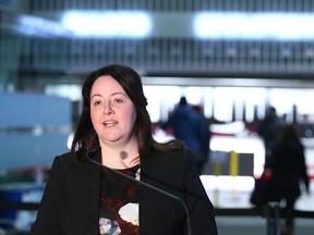 Lisa Kahn, growth strategies co-ordinator at the City of Calgary, speaks to media about secondary suites at City Hall on Thursday, Feb. 8, 2018.