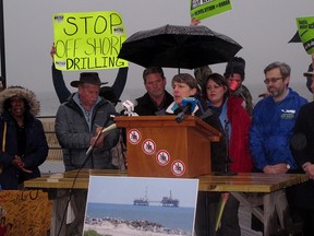 Cindy Zipf, executive director of the Clean Ocean Action environmental group, speaks at a rally in Asbury Park, N.J., against President Trump's plan to allow oil and natural gas drilling off most of the nation's coastline.