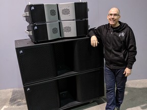 Jeremy Bridge, president PK Sound, with Calgary-made Trinity 10 and Gravity speakers.