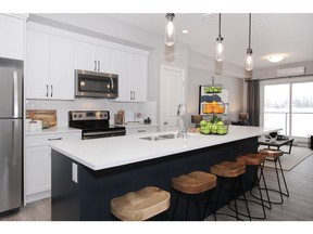 The kitchen in the show suite displayed at the Rise sales centre by Cedarglen Living.