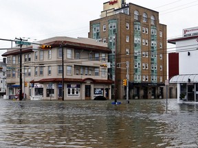 Ocean City, N.J., is flooded by a storm surge from Superstorm Sandy on Oct. 30, 2012. New satellite research shows that melting ice sheets in Greenland and Antarctica are speeding up sea level rise.