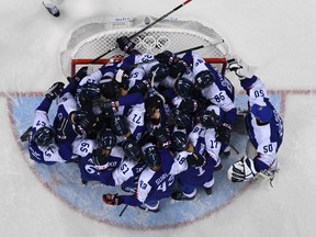 Slovakia celebrates after beating the Olympic Athletes of Russia (GETTY IMAGES)