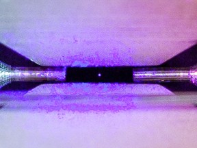 An image of a single positively-charged strontium atom has won the overall prize in a national science photography competition organized by the Engineering and Physical Sciences Research Council (EPSRC).