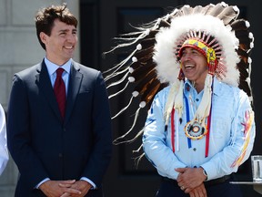 Prime Minister Justin Trudeau and Perry Bellegarde, national chief of the Assembly of First Nations, celebrate National Indigenous Peoples Day in Ottawa on Wednesday, June 21, 2017.