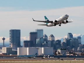 An WestJet Boeing 737 takes off from Calgary International Airport on Sunday November 13, 2016.