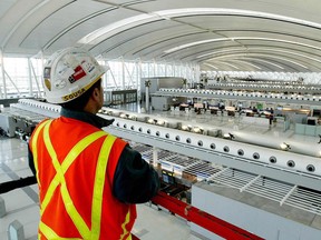 An Aecon Construction worker at Toronto Pearson International Airport.