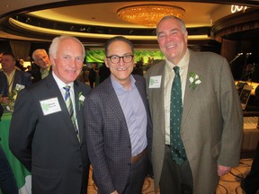 Joining Alberta Finance Minister Joe Ceci (centre) at  Boyden Global Executive Search's Guinness & Green St. Patrick's Day bash are Boyden partner Brent Shervey (left) and Tim Hamilton. The fun fete raised nearly $50,000 for Ronald McDonald House.
