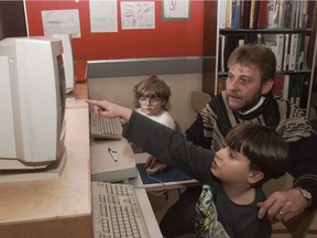 In 1998, computers had become popular in offices and schools, as seen in this photo of a Calgary elementary school computer lab. But, less than half of us actually had a computer at home.