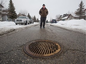 Somerset resident Barry Zebkowitz stands near one of the storm drains in his neighbourhood which is releasing strong rotten egg smells the same strong gases are also coming up through drains in homes in the area causing health worries. Zebkowitz was photographed on Saturday March 17, 2018. Gavin Young/Postmedia