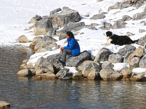 Soaking up the sun along the Elbow River on Monday March 18, 2018.