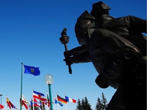 The Share the Flame statue at the Canada Olympic Park at WinSport. Calgary is considering another Winter Olympics bid but a city economist warns the provincial budget might bode ill for it.