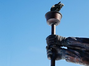 The Share the Flame statue at the Canada Olympic Park at WinSport, Calgary is considering another Winter Olympics bid. Al Charest/Postmedia