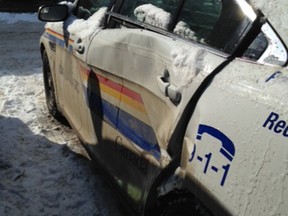 Red Deer RCMP arrest man after collisions with building, cars and police vehicle. Image supplied